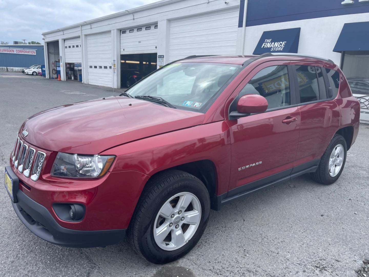 2016 RED Jeep Compass Latitude FWD (1C4NJCEA4GD) with an 2.0L L4 DOHC 16V engine, CVT transmission, located at 1254 Manheim Pike, Lancaster, PA, 17601, (717) 393-9133, 40.062870, -76.323273 - Photo#0